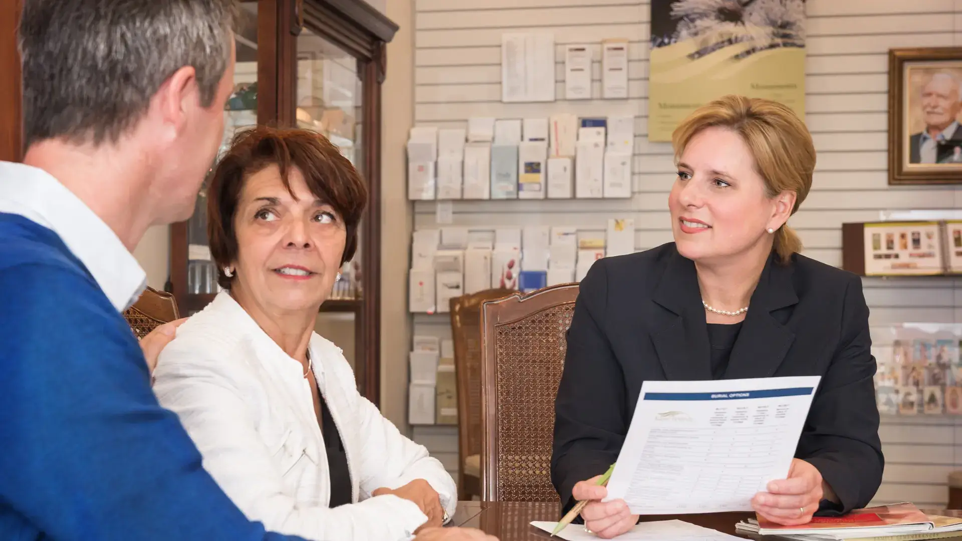 Funeral director meeting with clients to discuss funeral arrangements and pre-planning services at Kane Fetterly Funeral Home in Montreal