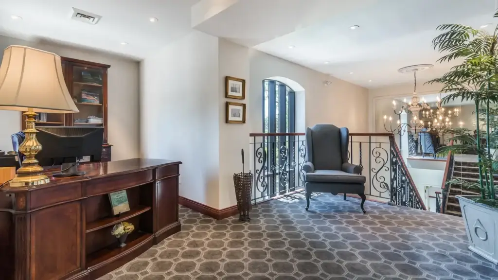 Upper-level receiving area at Kane Fetterly Funeral Home in Montreal, featuring elegant décor, warm lighting, and a welcoming atmosphere